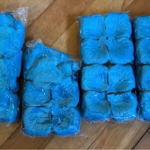 Packs of Teal Artificial Flower Petals